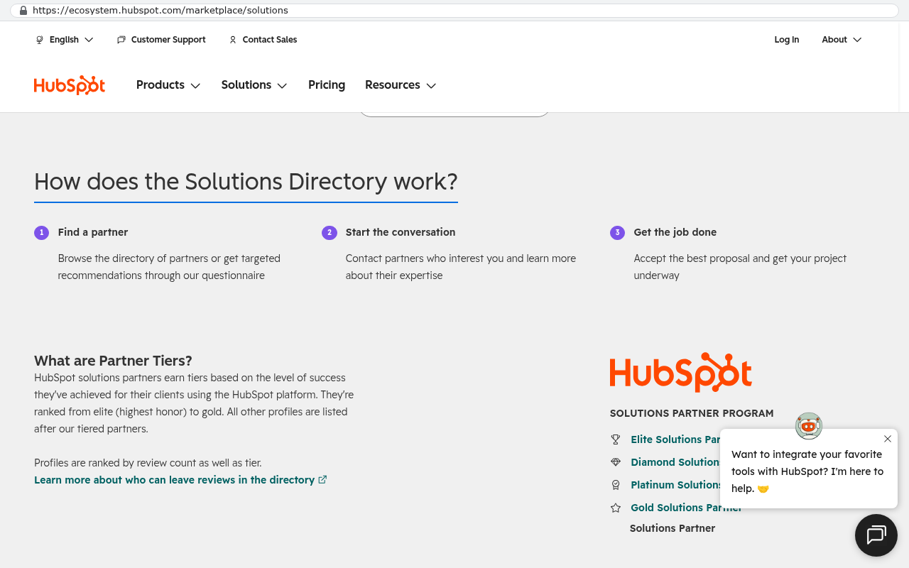 HubSpot Solutions Directory page showing the Solutions Partner Program with partner tier categories and explanation of how the directory helps users find and contact partners